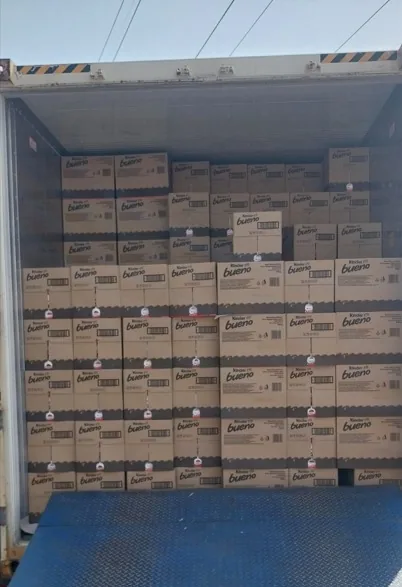 Cased confectionery hand-stacked in a trailer